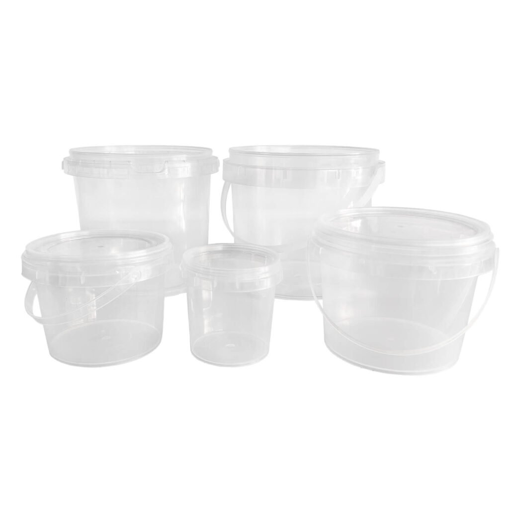 Multiple transparent round plastic buckets of different sizes