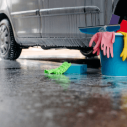 Blue Plastic Car Wash Bucket In Use